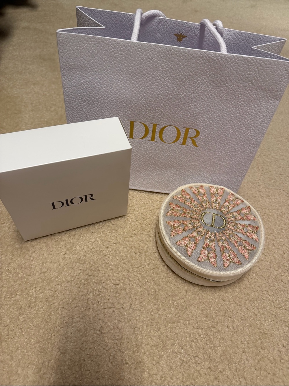 Dior White & Gold Branded Pouch Packaging